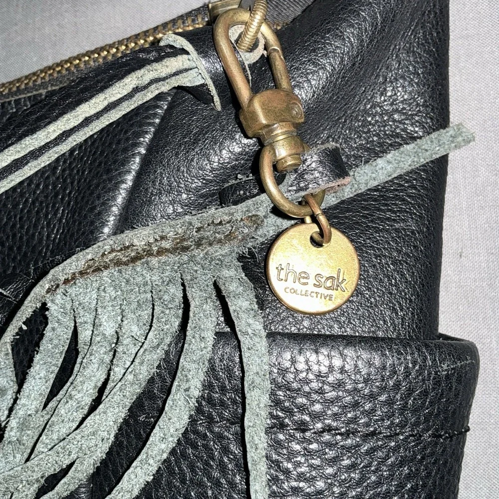 The Sak Hobo Bag Womens Leather Hobo Shoulder Bag With Bag Charm *read